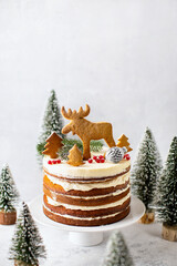 Christmas cake decorated with deer shaped gingerbread