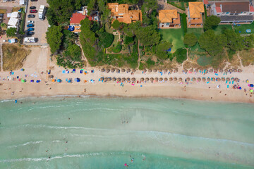 An aerial top down view on Playa de Muro beach on Mallorca island in Spain