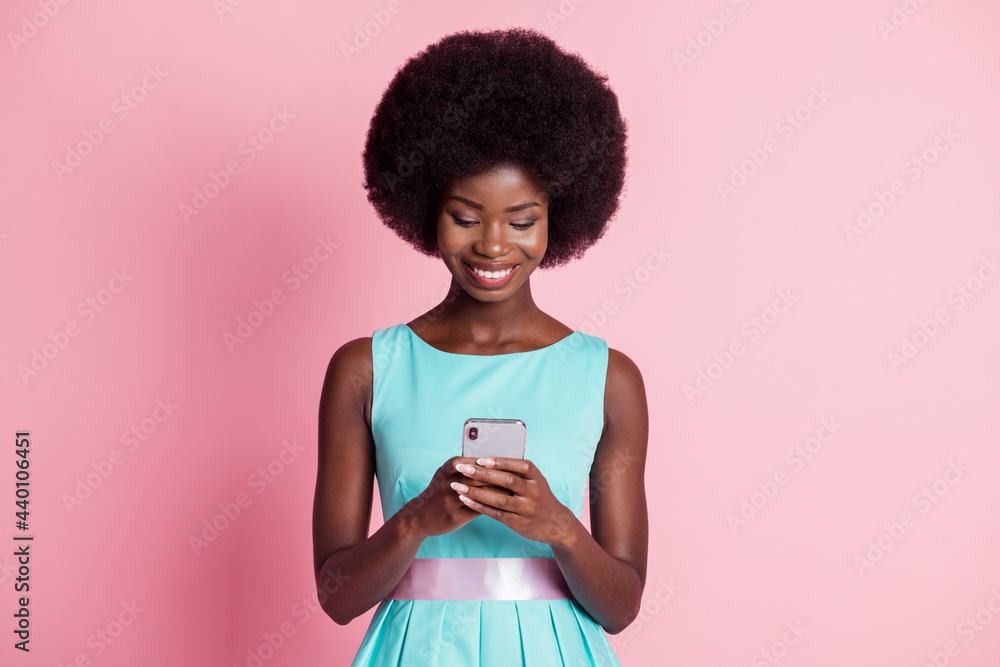 Sticker photo of young beautiful smiling african girl blogger using smartphone wear blue dress isolated on p