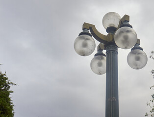 The light pole is off on a cloudy day