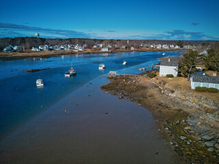 Aerial drone image of low tide at the entrance to the Cape Porpoise Maine harbor on the New England...