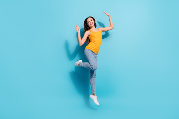 Fototapeta na wymiar Full length body size photo girl careless jumping up happy pretty isolated pastel blue color background