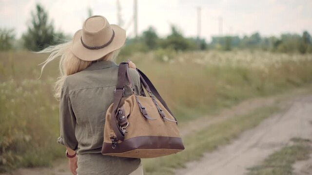 Woman On Safari Clothes Style.Inspiration Travel On Africa.Stylish Outfit On Wildlife Landscape.Tourist Trendy Look On Vacation Trip.Happiness Scenic Fashion Model.Summer Adventure On Africa Reserve.