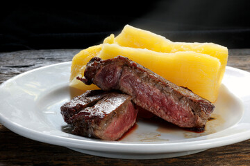 Roast beef open in half with cassava