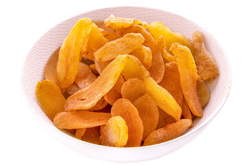 slices of ginger in sugar and cinnamon in a light plate on a white background. isolated foods in a white dish on a white background . Isolated items and products.