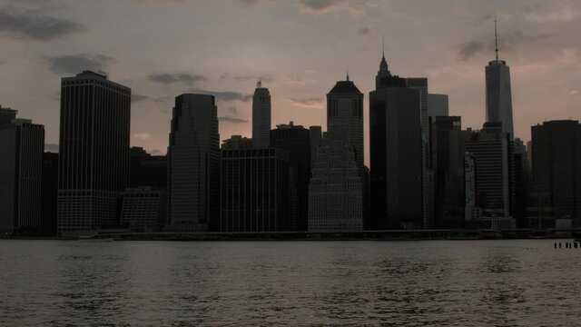 new york skyline from brooklynn bridge park clouds sunset time lapse