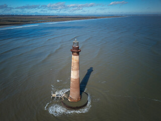 Aerial drone image of the Morris Island Lighthouse at the entrance to Charleston Harbor South...