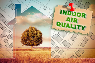 Indoor Air Quality - Healthy lifestyle with a small house against a countryside with a lone tree and city map on background