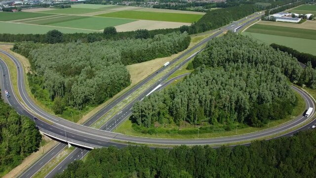 Traffic at a highway junction where the A6 and N50 highways cross in Flevoland near Emmeloord in The Netherlands.