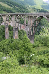 Fototapeta na wymiar Djurdjevic stone suspension bridge in Montenegro