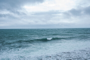 Seascape. Natural background. The sea with waves in daylight.