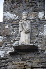 Statue an einem Haus in Kerascoet
