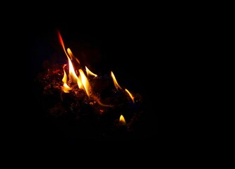 Fire flames in the dark night. Abstract background image