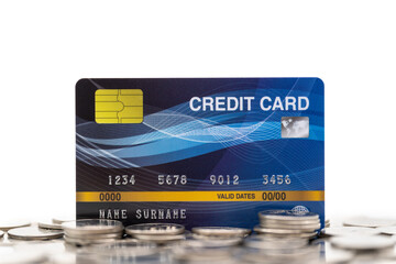 Business Financial and Money Concept. CLoseup of Fake mockup credit card on pile of coins cutout isolated white background.