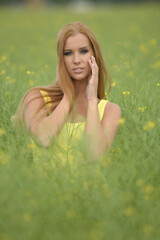 portrait of a beautiful woman in the field