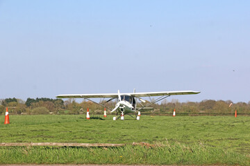 Ultralight airplane on a grass strip