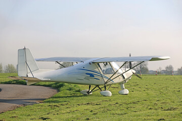 Ultralight airplane on a grass strip