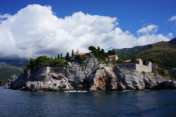 Fototapeta na wymiar Panorama of Peninsula Sveti Stefan from the sea, Montenegro