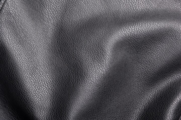 Closeup of black heavy leather material with deep texture, highlights and shade for design, texture background and displacement maps, with large canvas and copy space