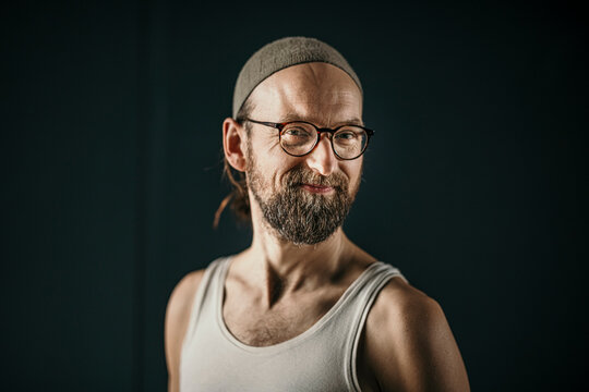 Smiling Mature Man In Exercise Room