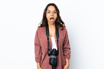 Young photographer woman over isolated white background with surprise facial expression