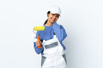 Painter woman over isolated white background laughing