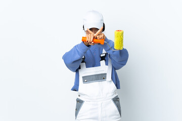 Painter woman over isolated white background making stop gesture with her hand to stop an act
