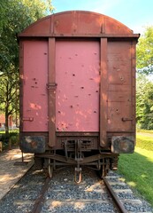 Fototapeta na wymiar Bullet marks in a train wagon.A bulleted train. Attack the train with a gun. A train car hit by a lead gun