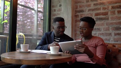 Business advisor meeting at coffee shop - Powered by Adobe