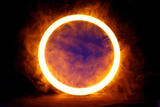 Sci Fi modern. Futuristic smoke. Neon color geometric circle on a dark background. Round mystical portal.