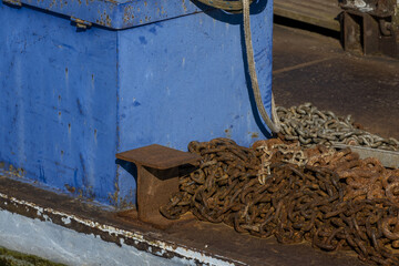 rusty chain on an old pontoon on Lake Geneva, Switzerland