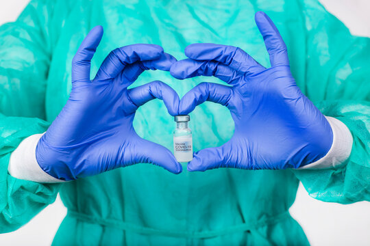 Hands of doctor holding Covid-19 vaccine