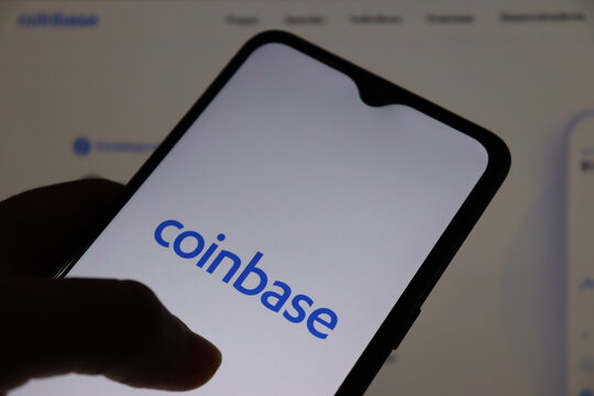 Bahia, Brazil - April 10, 2021: Coinbase logo on smartphone screen. Cryptocurrency exchange and digital asset platform. 