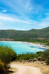 Stunning view of a white sand beach bathed by a beautiful turquoise sea. Marinella Beach, Porto Rotondo,Sardinia, Italy.