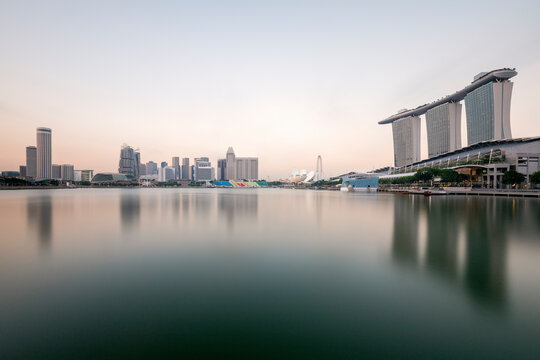 Singapore, Long exposure of Marina Bay at dusk with Marina Bay Sands resort in background