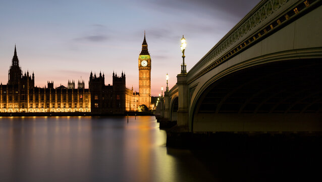 UK, England, London, Panorama of Westminster Bridge and River Thames at dusk with Palace Of Westminster in background - Powered by Adobe