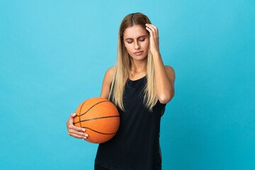 Young woman playing basketball  isolated on white background with headache