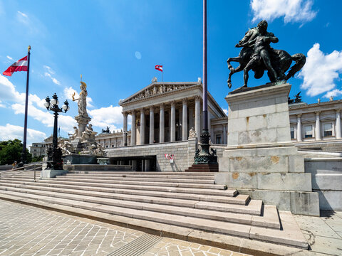 Austria, Vienna, Steps of Austrian Parliament Building with Pallas Athena Fountain in background