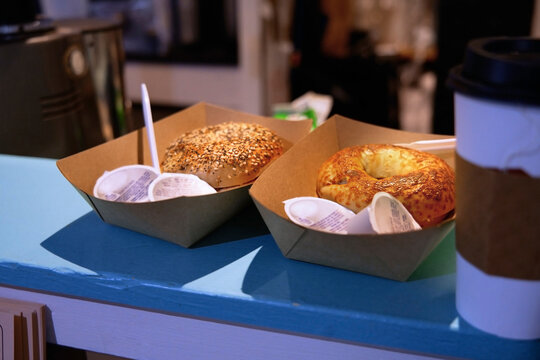 Fresh doughnuts in take out cartons