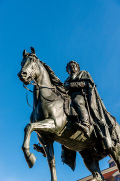 Germany, Thuringia, Weimar, Equestrian statue of Grand Duke Carl August against blue sky