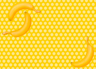 Studio shot of three bananas lying against yellow polka dot background