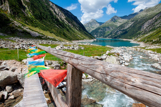 Colorful cloths hanging on wooden railing at Zillertal, Austria