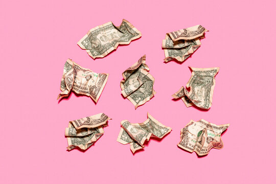 Studio shot of eight crumpled one dollar bills
