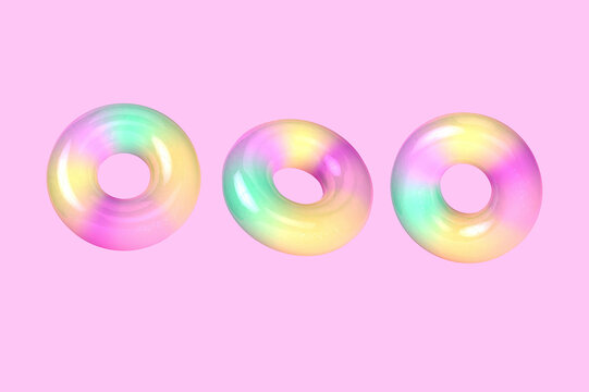 Three dimensional render of colorful doughnuts against pink background