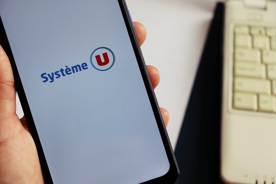 Bahia, Brazil - May, 2025: Syst&egrave;me U logo on smartphone screen.  Syst&egrave;me U is a French retail cooperative group. Super U. 
