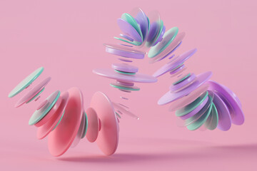 Three dimensional render of pastel colored rings floating against pink background