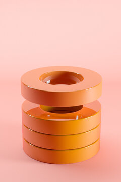 Three dimensional render of stack of orange glossy rings