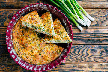 Homemade Pie with green onions and egg.