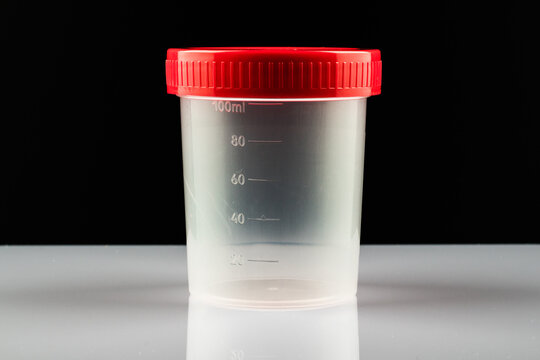 Empty container for collecting samples. Medical tests. Analysis of urine. Drug test.