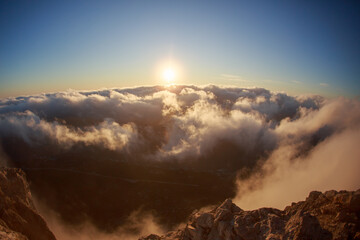 High view of the mountains and view down to the sea, mountains and sunset